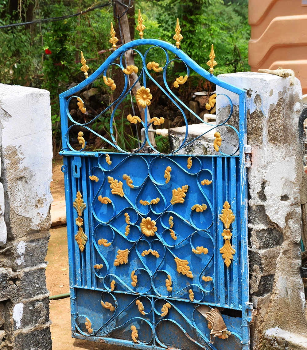 opening doors - blue gate